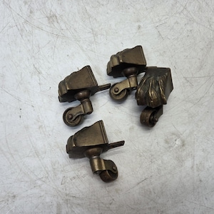 Set of 4 heavy Solid brass table castors with paw claw feet victorian style