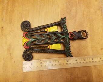 Antique broom trivet hand painted cast iron pot holder kitchen decor