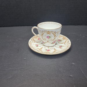 Royal Doulton Burley & Co Chicago fancy floral and gold Demitasse tea cup and saucer