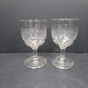 May include: A set of three ceramic mugs with a speckled, matte finish. The mugs are in shades of cream, light gray, and dark gray. Each mug has a simple, minimalist design, perfect for coffee or tea.