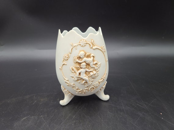 Antique Egg shaped 3 footed vase with cherubs playing music
