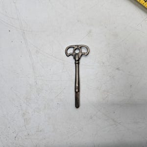Antique Rare and unusual key 5 point star bit fancy head