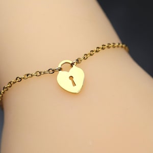 Day Collar * Anklet * Bracelet * Gold Plated Stainless Steel * Faux Heart Lock Charm * Locking Options * 24/7 Wear