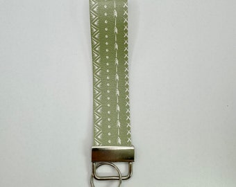 Green trendy keychain. Lightweight, handmade, vegan leather.