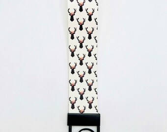 Deer with flowers holiday keychain, vegan leather, handmade, lightweight.