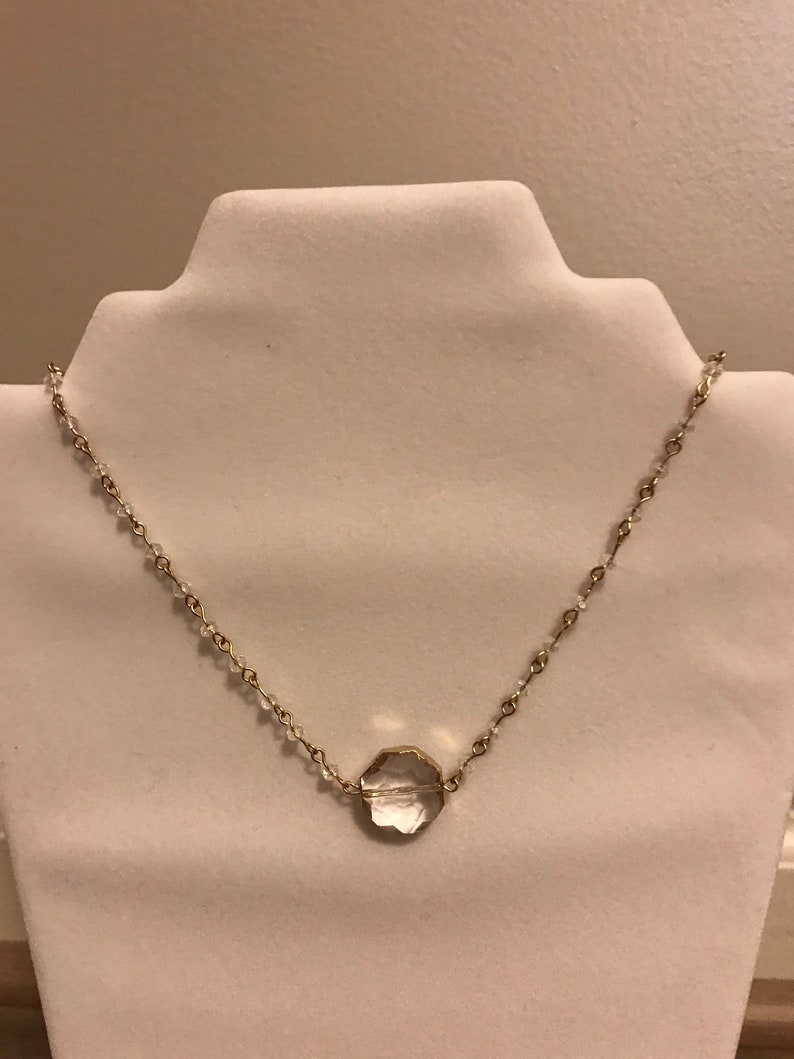 Clear glass beas necklace w circular crystal