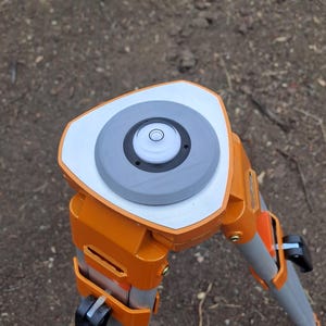 Stativvattenpass, centreringsanordning för lätt vattenpass, laservattenpass, vattenpass, stativvattenpass.