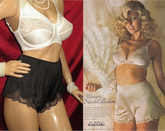 May include: Vintage lingerie set featuring a white lace bra and black shorts with a scalloped lace trim. The image also shows a woman wearing a similar lingerie set in a cream color. The advertisement is for the "Warners French Collection."