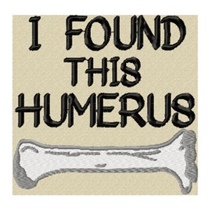 May include: A white bone with the text "I found this humerus" in black letters on a beige background.