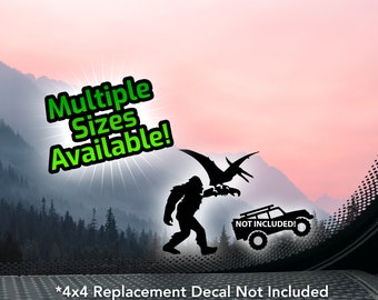 May include: A black silhouette of a Bigfoot holding a Pterodactyl against a pink and orange sunset background. The text "Multiple Sizes Available!" is in green letters. The text "*4x4 Replacement Decal Not Included Sold Separately" is at the bottom of the image.