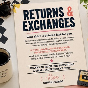 May include: A rectangular sign with a cream background featuring dark blue and coral text that reads RETURNS & EXCHANGES, Your shirt is printed just for you, IF YOUR ORDER ARRIVES DAMAGED, MISPRINTED, OR INCORRECT, and THANKS SO MUCH FOR SUPPORTING A SMALL INDEPENDENT SHOP.