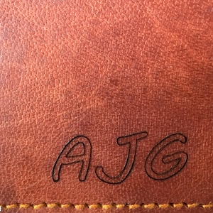 Add a laser engraved monogram or other personal message to your Heathbold laptop bag