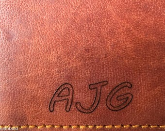 Add a laser engraved monogram or other personal message to your Heathbold laptop bag