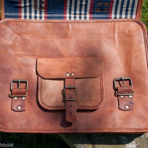 Satchel bag with flap open front view