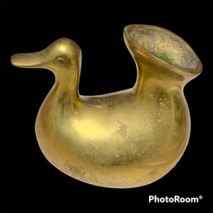 Odd little duck brass vase
