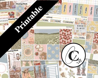 May include: Printable planner stickers with a floral theme. The stickers feature daisies, strawberries, and a field of grass. The text "Good Vibes" is featured on one of the stickers.