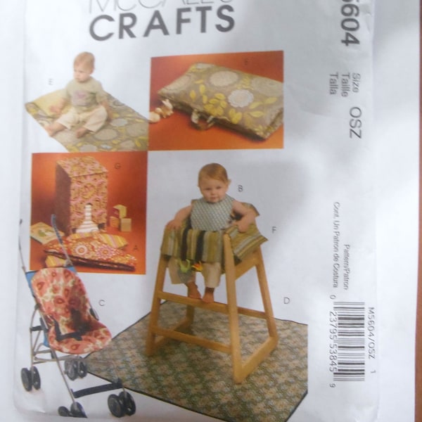 McCalls M5604 Sewing Patterns Baby Items Baby Hanger Covers, Bib, Stroller Liner,  and more. UNCUT