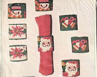 Bucilla Vintage Needlepoint Kit for 8 Christmas Napkin Rings w/Santa Bells Snowmen & Poinsettias Rare