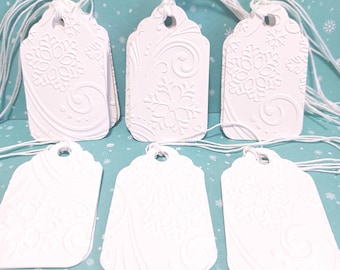 Set of 25 White embossed Snowflake tags, Christmas tags, Embossed gift tags, 2 1/2" x 1 1/2"
