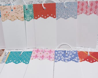 Gift tags, Price tags, Favor tags, Hang Tags, White Tags, Merchandise Tags. Size 3" x 1 1/2" Set of 25