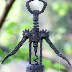 Glittered Black Cork Screw Man & Spoon Fish Windchime-Upcycled Housewares-Unique Kinetic Sculpture-Refurbished Metal Art-Wine Lovers Delight