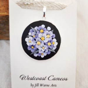 Blossoms, West Coast Cameos, hand sculped clay pendant.
