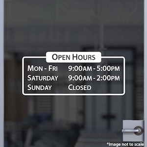 May include: White sign with black text indicating open hours for a business. The sign lists the days of the week and corresponding hours. Monday through Friday: 9:00 AM to 5:00 PM. Saturday: 9:00 AM to 2:00 PM. Sunday: Closed.