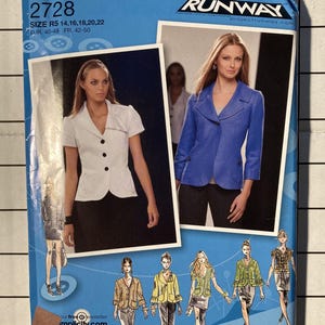 May include: A Simplicity 2728 sewing pattern package. The package features images of women's jackets and a short-sleeved top. The package is blue with the text "Project Runway" and "Simplicity" printed on it. The size range is R5 14,16,18,20,22.