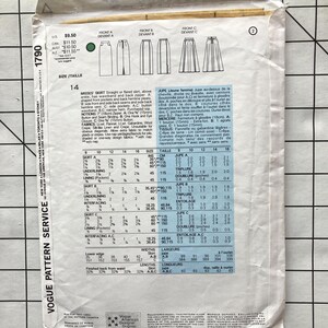 May include: A sewing pattern for a skirt with three different styles. The pattern includes instructions for a straight skirt, a flared skirt, and a skirt with side pockets. The pattern is for sizes 8-20.