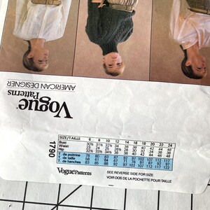 May include: A sewing pattern guide for a turtleneck sweater and a blouse. The pattern guide includes size charts in inches for bust, waist, hip, chest, waist, and hips. The pattern number is 1790.