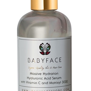 May include: A clear glass bottle with a gold lid and label. The label reads "BABYFACE Superior Quality Skin & Hair Care Massive Hydration Hyaluronic Acid Serum with Vitamin C and Matrixyl 3000 WWW.BABYFACESTORE.COM".
