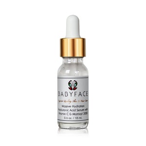 May include: A clear glass bottle with a gold cap and dropper, containing a hyaluronic acid serum with vitamin C and Matrixyl 3000. The bottle is labeled "BABYFACE Superior Quality Skin & Hair Care Massive Hydration Hyaluronic Acid Serum with Vitamin C & Matrixyl 3000 0.6 oz. / 18 ml."