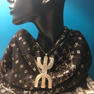 HOLDING: XL Amazigh Silver Tuareg Talisman Amulet Necklace on onyx beads Hand engraved Africa