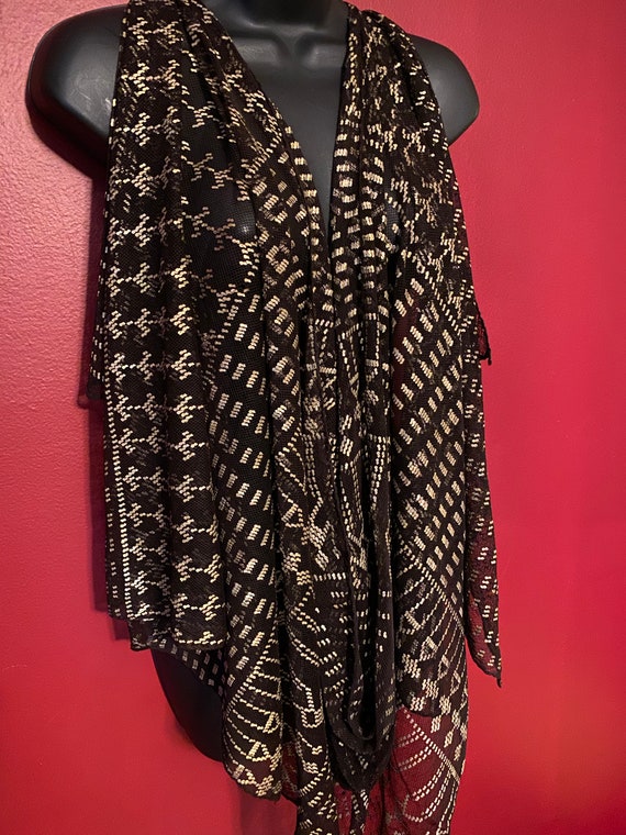 Strike a pose, antique assuit shawl with an attitu