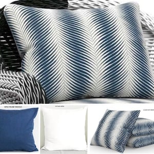May include: Three decorative throw pillows with a chevron pattern in shades of blue and white. The pillows are arranged in a row, with the largest pillow in the back and the two smaller pillows in front. The pillows are made of a soft, comfortable fabric and would be a great addition to any living room or bedroom.