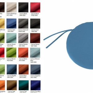 May include: A round, blue, fabric chair cushion with ties. The cushion is shown against a white background with a color chart of 48 different fabric swatches.