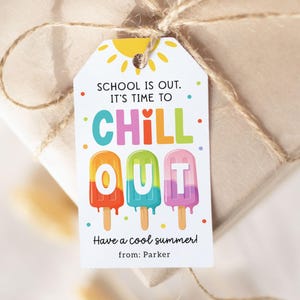 May include: A gift tag with the text "SCHOOL IS OUT. IT'S TIME TO CHILL OUT" and three colorful popsicle illustrations. The tag is tied to a wrapped gift with twine. The tag also says "Have a cool summer! from: Parker."