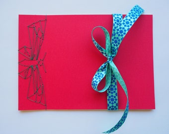 Handmade notebooks with unique hand-bound decorative designs in red with butterfly binding--gift for her