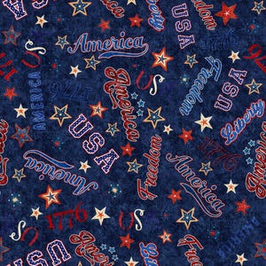 May include: A patriotic fabric design featuring a navy blue background with scattered stars and text. The words "America", "USA", "Freedom", and "Liberty" are displayed in red, white, and blue, along with the number "1776".