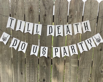 May include: White banner with black text that reads "Till Death Do Us Party" with a skeleton hand graphic on each end.