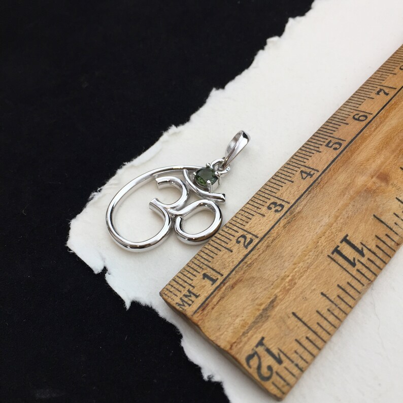 Om Symbol 5mm Round Faceted Genuine Moldavite and Sterling Silver Rhodium Plated Pendant