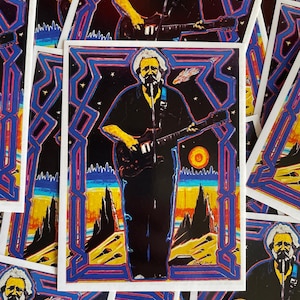 May include: A colorful psychedelic illustration of a musician playing a guitar in front of a starry night sky. The musician is wearing a black shirt and has a long beard. The background features a geometric pattern in shades of blue, purple, and yellow.