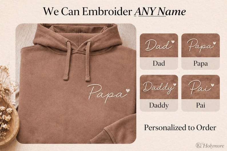 Pode incluir: Um moletom marrom com a palavra "Papa" bordada na frente. A imagem tamb&eacute;m mostra exemplos de op&ccedil;&otilde;es de bordado personalizado, incluindo "Dad", "Papa", "Daddy" e "Pai".
