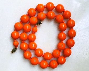 Vintage acidulous orange glass beads necklace France 1930s