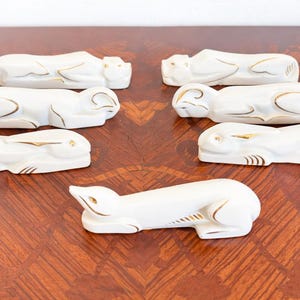 Lot de 12 porte-couteaux zoomorphes en porcelaine blanche Années 30 Art déco - Vendu