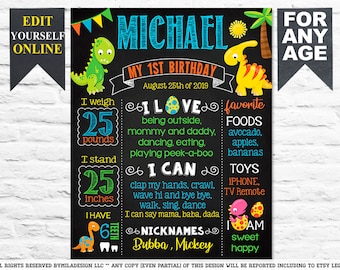 May include: Black chalkboard-style birthday sign with the name "Michael" and "My 1st Birthday." Includes dinosaur illustrations, measurements in pounds and inches, and the text "I weigh 25 pounds, I stand 25 inches."
