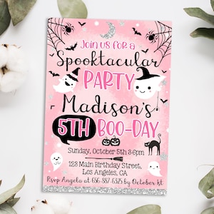 May include: Pink Halloween party invitation with the text "Join us for a Spooktacular Party". The invitation includes ghosts, bats, spiders, and the text "Madison's 5th Boo-Day". The invitation also includes the date, time, and location.