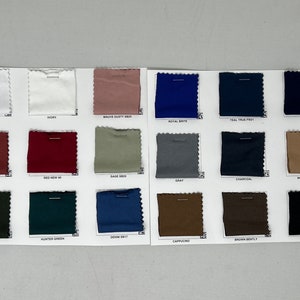 May include: Swatch card with 18 fabric samples in various colors, including white, ivory, mauve, royal blue, teal, navy, marsala, red, sage, gray, charcoal, mocha, olive, hunter green, denim, cappuccino, brown, and black.