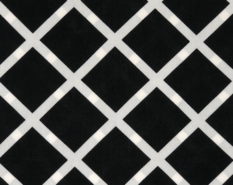 May include: A repeating pattern of black diamonds separated by white lines. The design creates a grid-like appearance, suitable for various fabric applications. The contrast between black and white creates a bold visual effect.