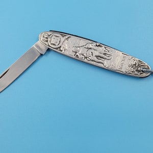 Navaja de bolsillo suiza única y rara de William Tell e hijo con la navaja Lion Repousse